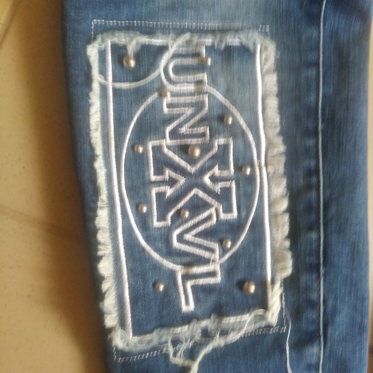 Spodnie damskie jeansowe rozmiar M/L