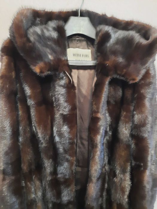 Норкова жіноча шуба
