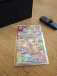 Mariokart 8 deluxe Nintendo Switch trzymana w protektorze