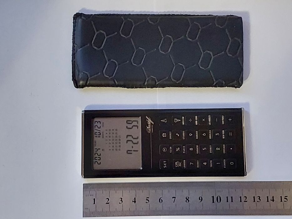 Карманный калькулятор часы оргонайзер