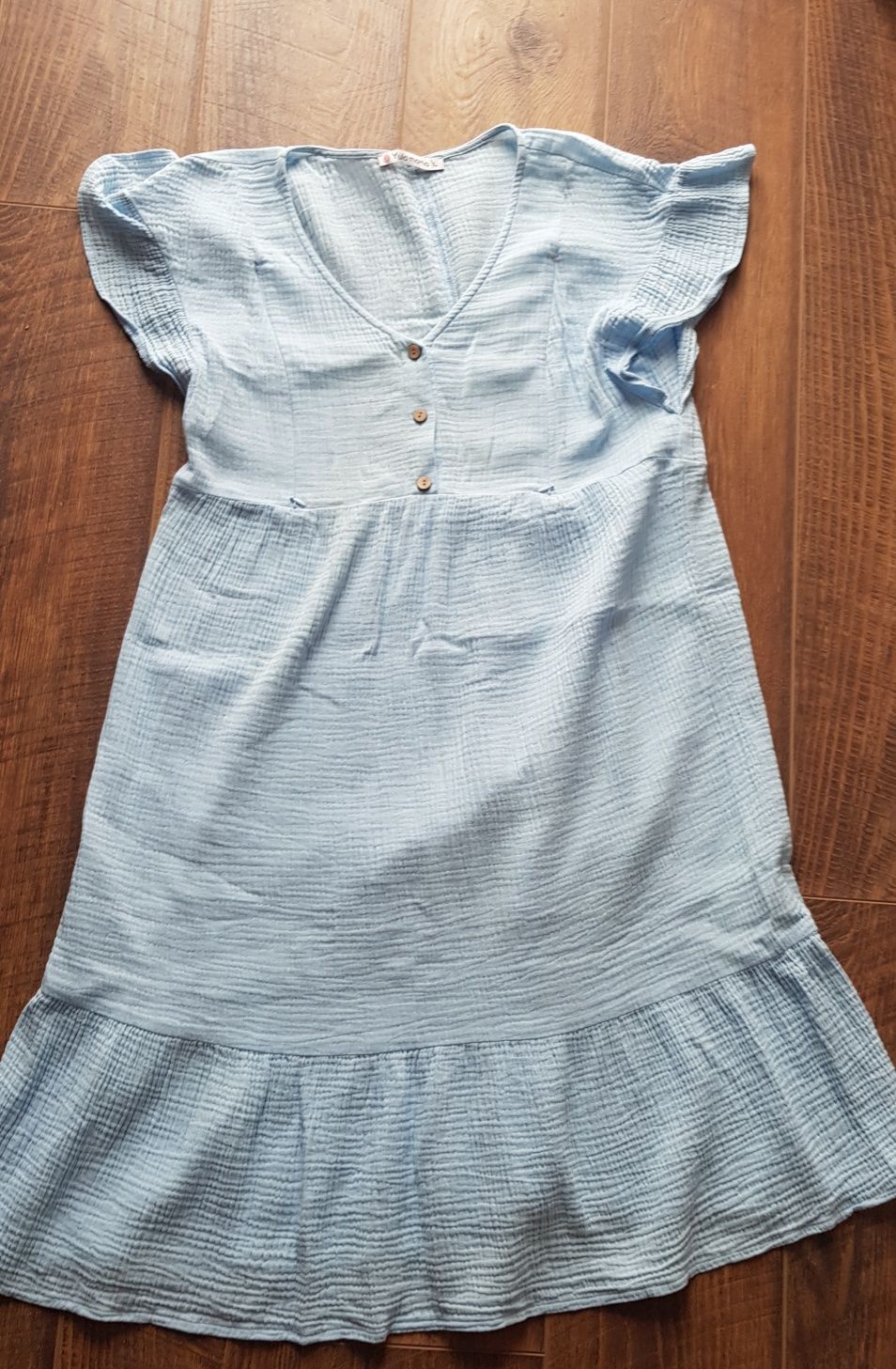 Муслінове ніжно-блакитне плаття для вагітних