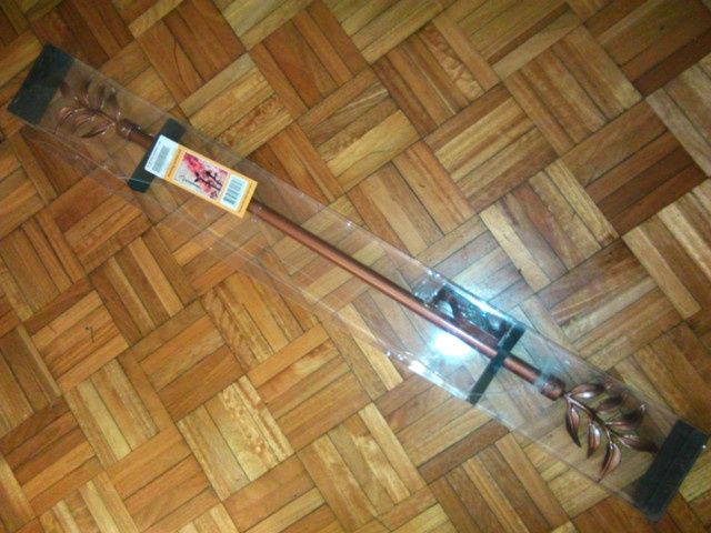 Varão cortinado de cor bronze