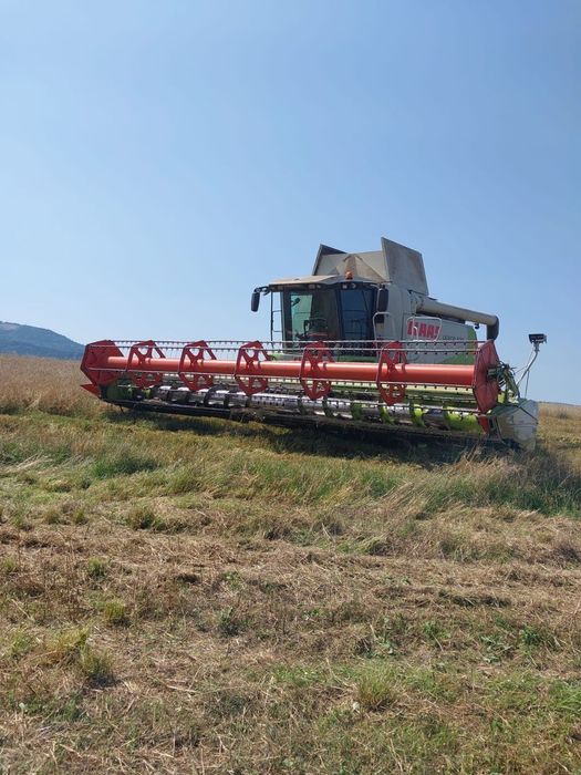 Claas Lexion 570  CLAAS LEXION 570 (2007) — heder 9 m, silnik CAT, garażowany