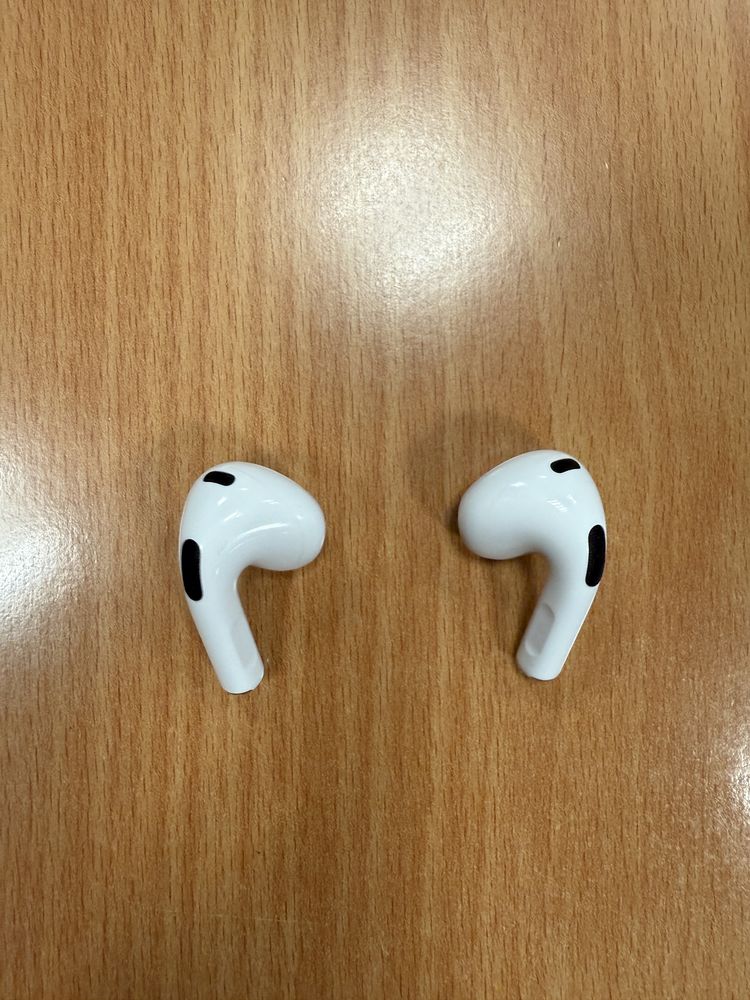 AirPods Apple 3rd  Original Generation with top-up Lightning Case.