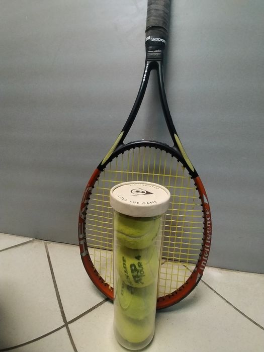 Ракетка для великого тенісу та м'ячі
