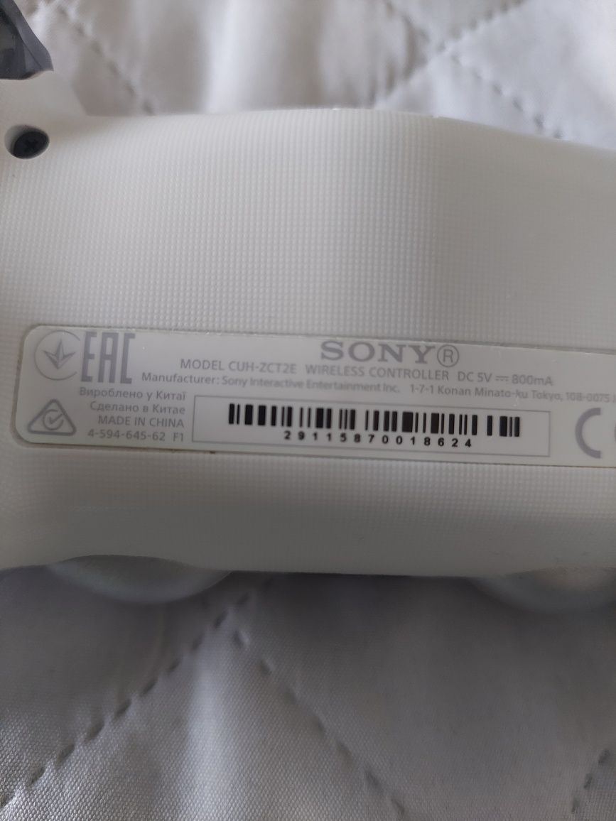 Pad Dualshock PS4 srebrny oruginał
