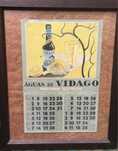 folha calendário "Águas de Vidago - março/abril 1959" com moldura