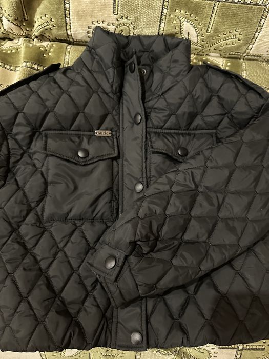 Нова стильна куртка