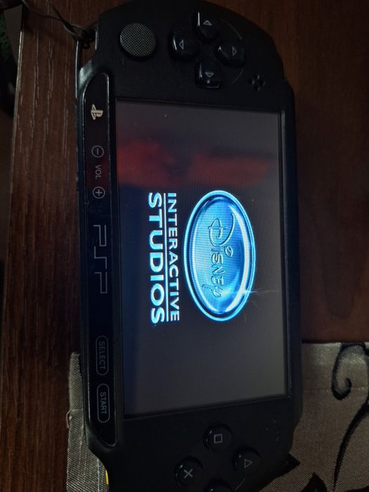 Konsola PSP , gra , ladowarka