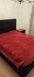 Cama de casal e sofá