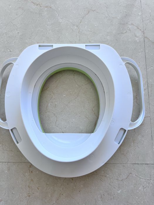 Redutor de sanita para criança