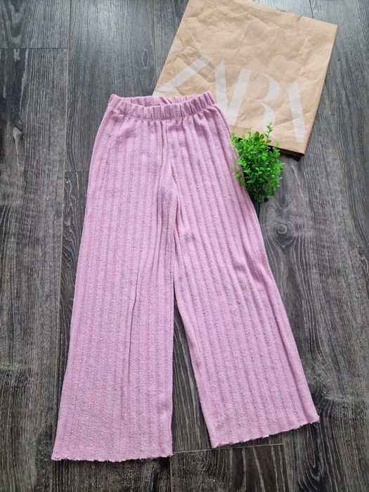 Zara dzianinowe spidnie z szeroką nogawką pudrowy róż r. 128