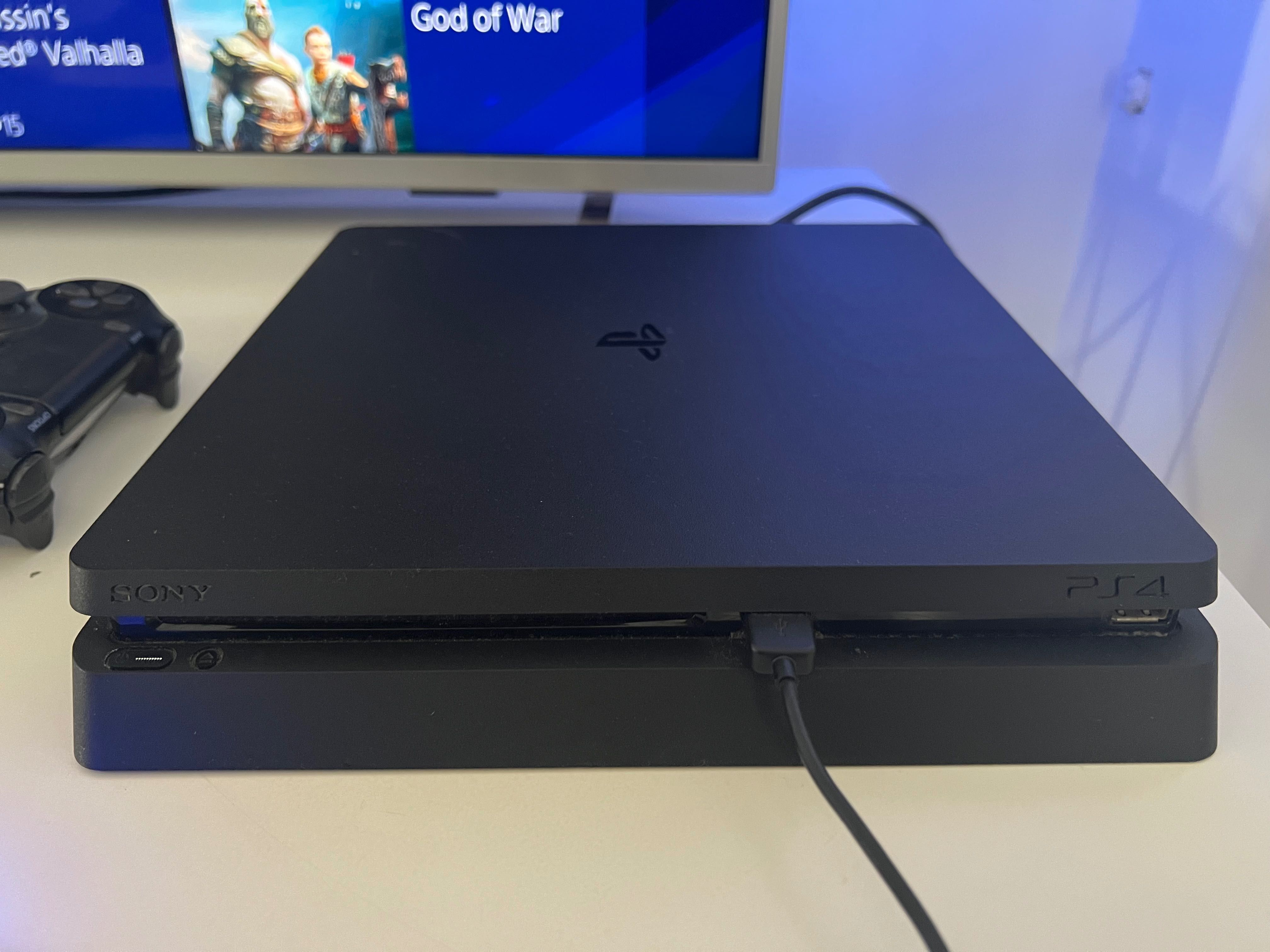 Ps4 slim 500GB, 2 comandos e conta psn com mais de 60 jogos digitais