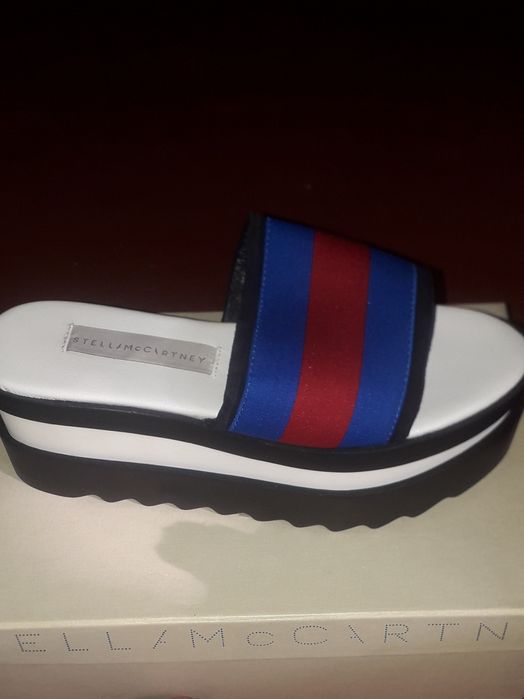 Продам новые шлепанцы