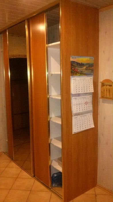 Dwie szafy przesuwne, pod zabudowę (duże lustro, półki, wieszaki)