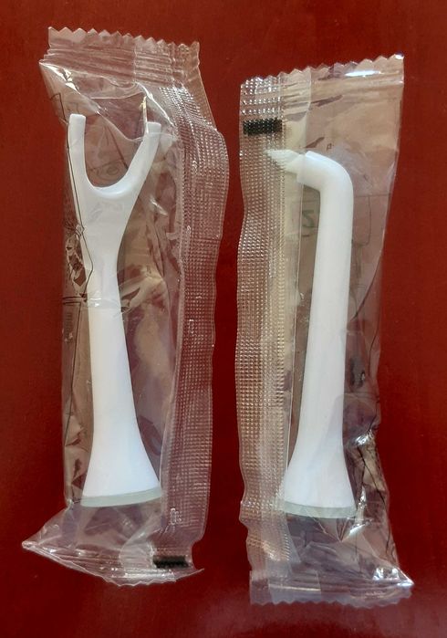 Dwie końcówki Philips Sonicare Nevadent Jednopęczkowa i Do Nitkowania