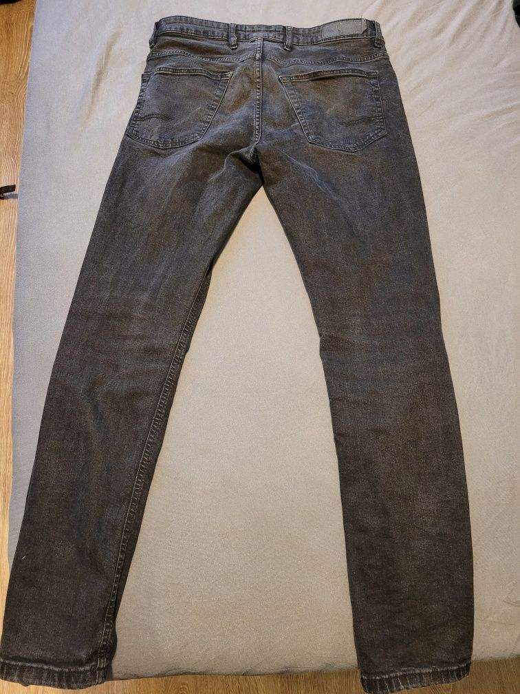 Czarne spodnie jeansy  170+ H&M