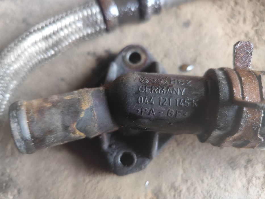 VW Transporter T4 1.9 TD rura przewód wody obudowa termostatu czujnik