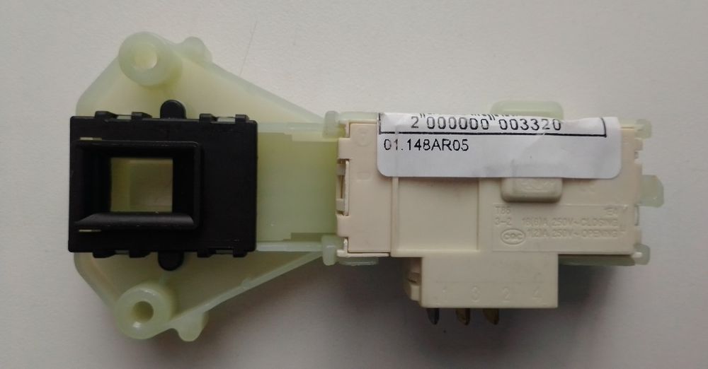 Замок дверці, indesit ariston