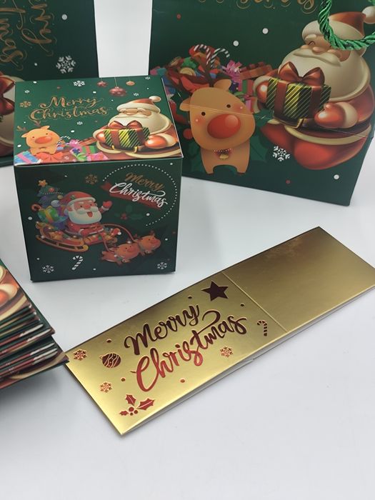 Nowe pudełka świąteczne Merry Christmas z gumką do prezentów