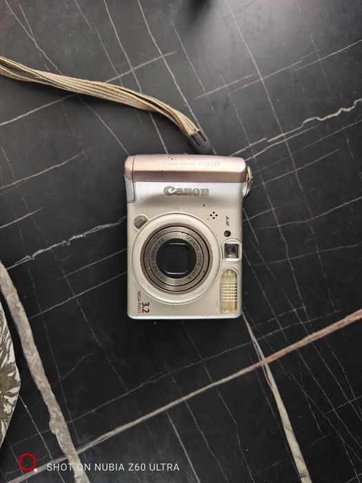 продам телефон, фотоапарат, часи