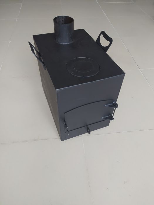 Буржуйка.з варочною поверхею.топка.кухня польова.печь.печка.пічка.камі