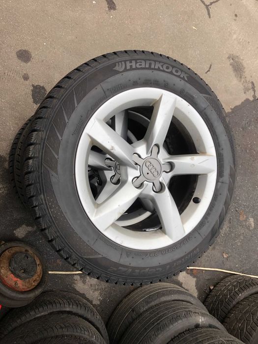 Диски комплект AUDI  A4 2012 року з шинами R16
