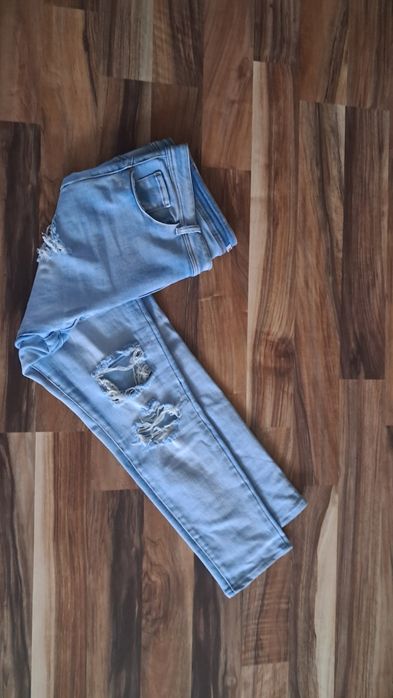 Spodnie z dziurami 48/52