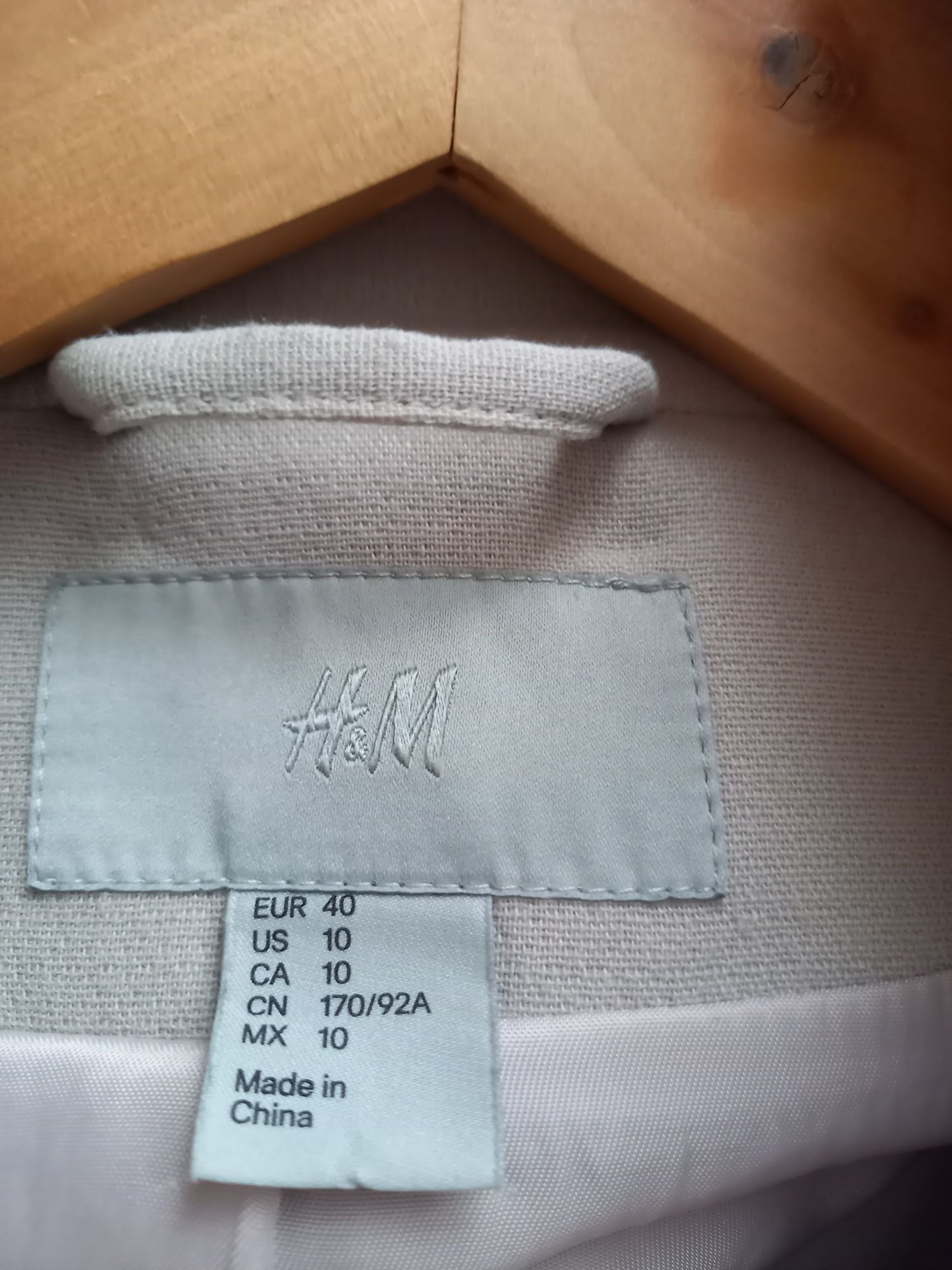 Jasno beżowy plaszcz H&M rozmiar 10
