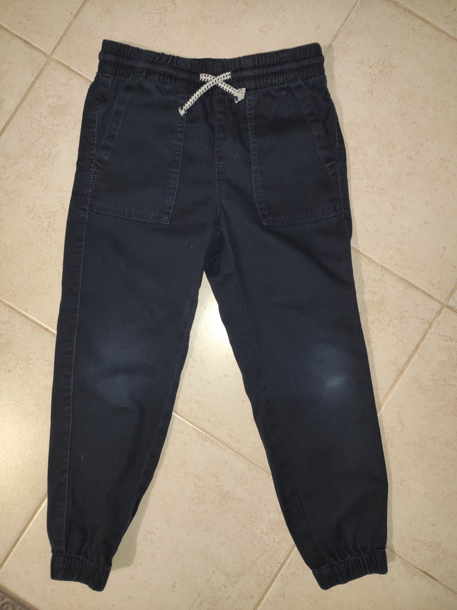 Granatowe joggery chłopięce na gumce H&M 116
