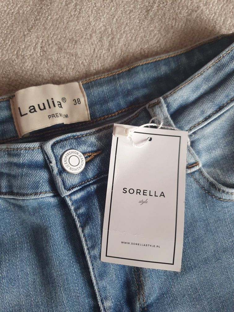 Spodnie jeansowe Laulia z przetarciami i dziurami r.38
