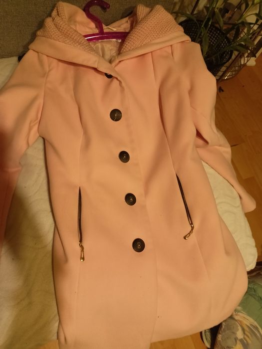 Nowy różowy płaszczyk