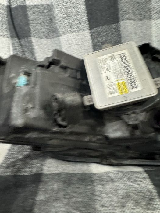 Фара ліва Touareg NF Європа, скло фари, маска фари