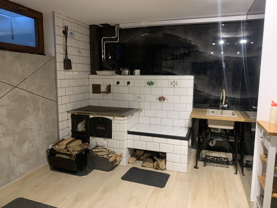 Domek całoroczny nad jeziorem z balią.