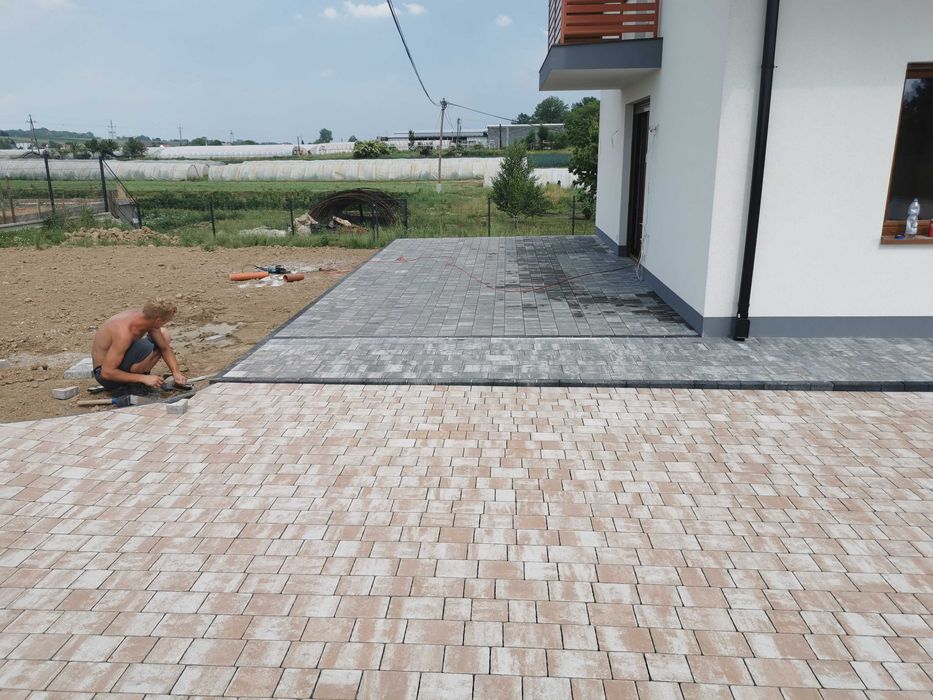 Brukarstwo Układanie kostki brukowej.