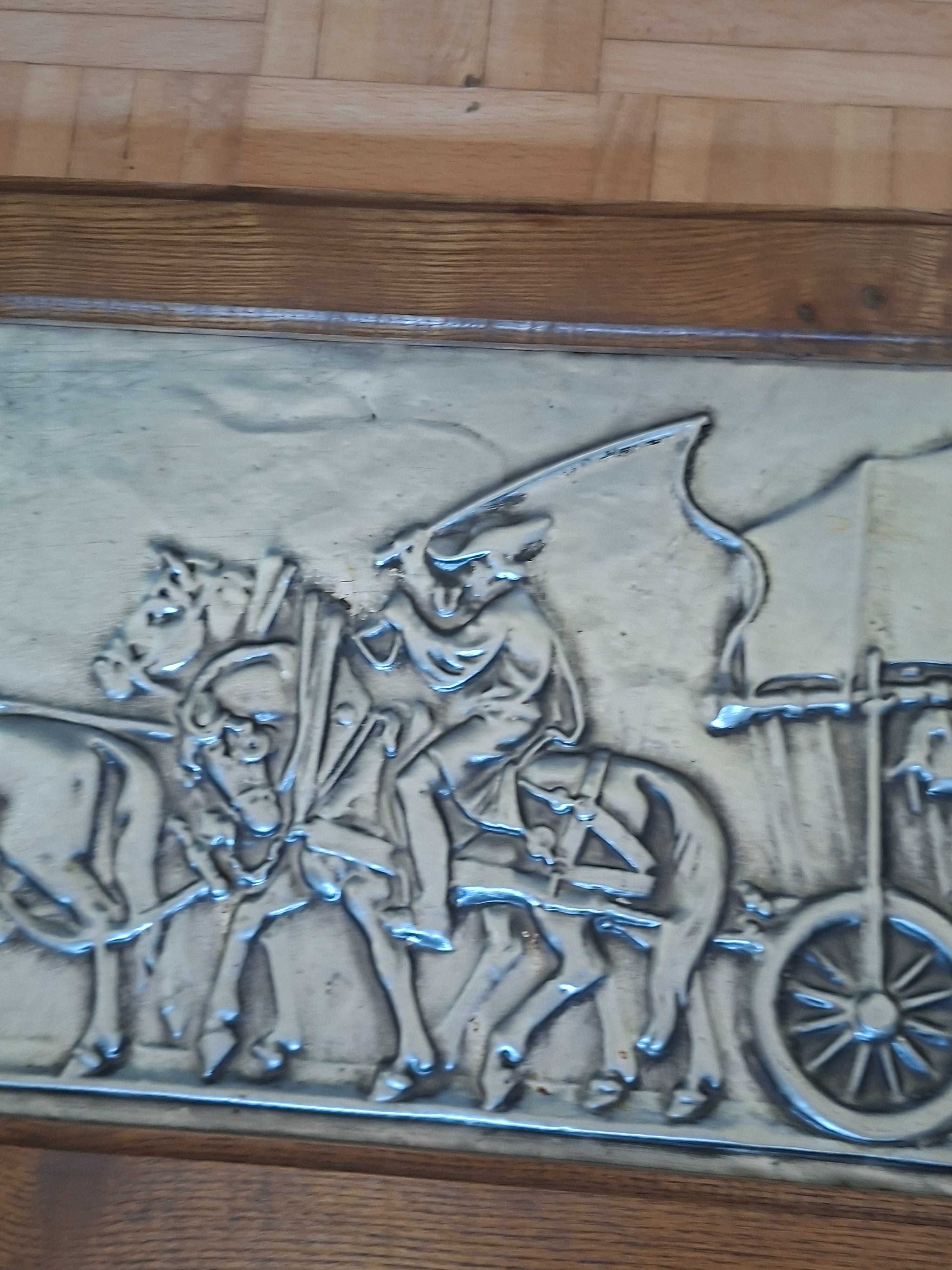 Płaskorzeźba metalowa