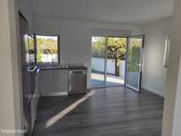 Apartamento moradia renovado -com garagem e jardim