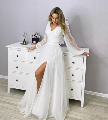 Совершенно новое блестящее свадебное платье, весiльна сукня