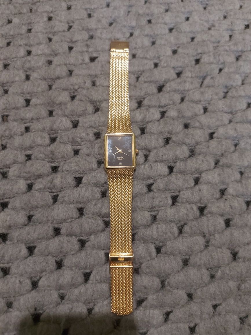 Xavier Ladies Quartz Gold Tone Black Face With Diamonds Wrist Watch