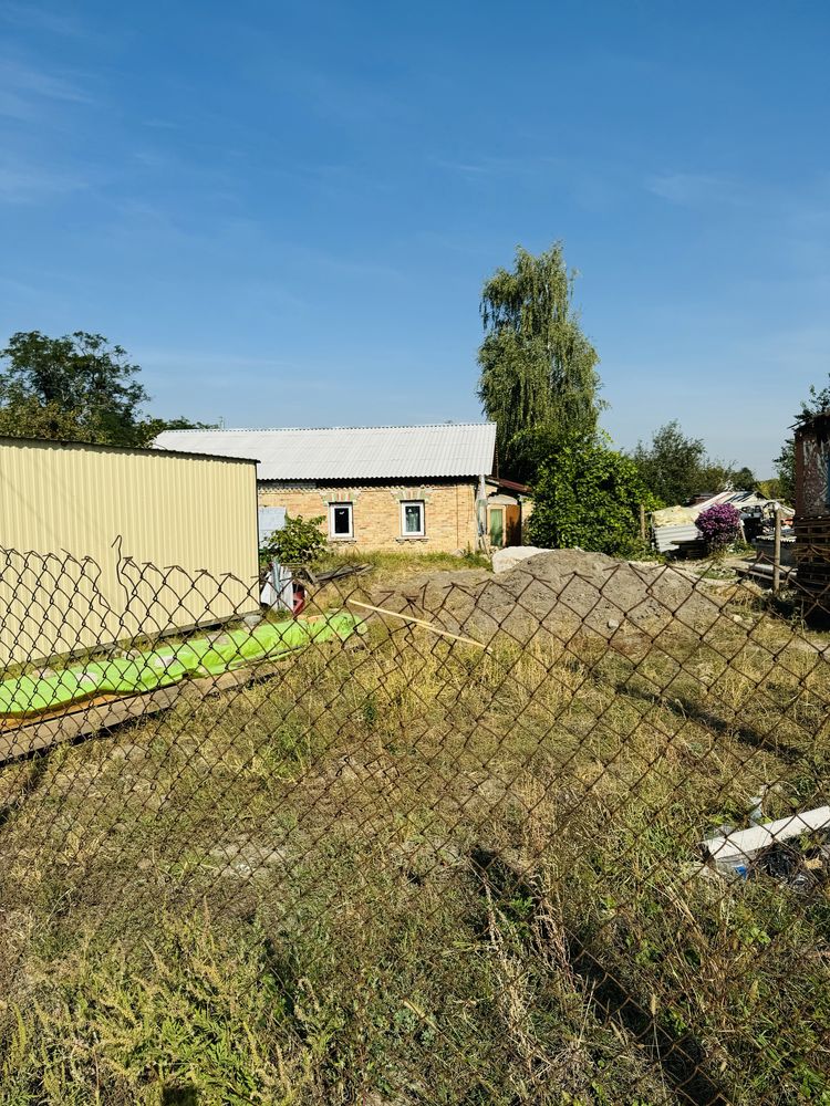 Продаж 1/2будинку  з земельною ділянкою у Гатному