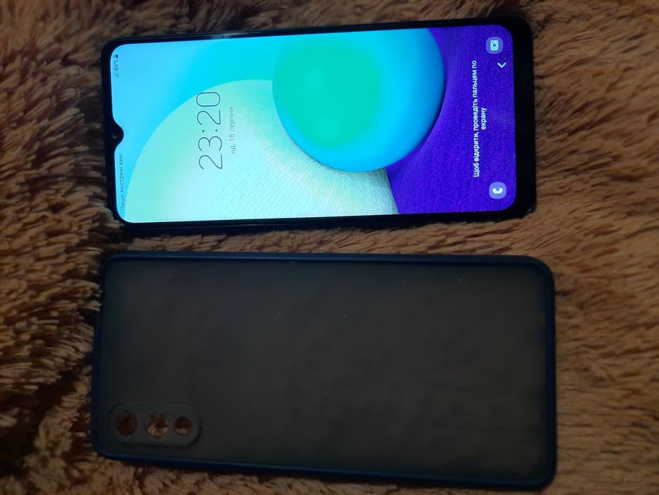 Продам мобильный телефон  Samsung A02 память 2×32гб в отличном состоян