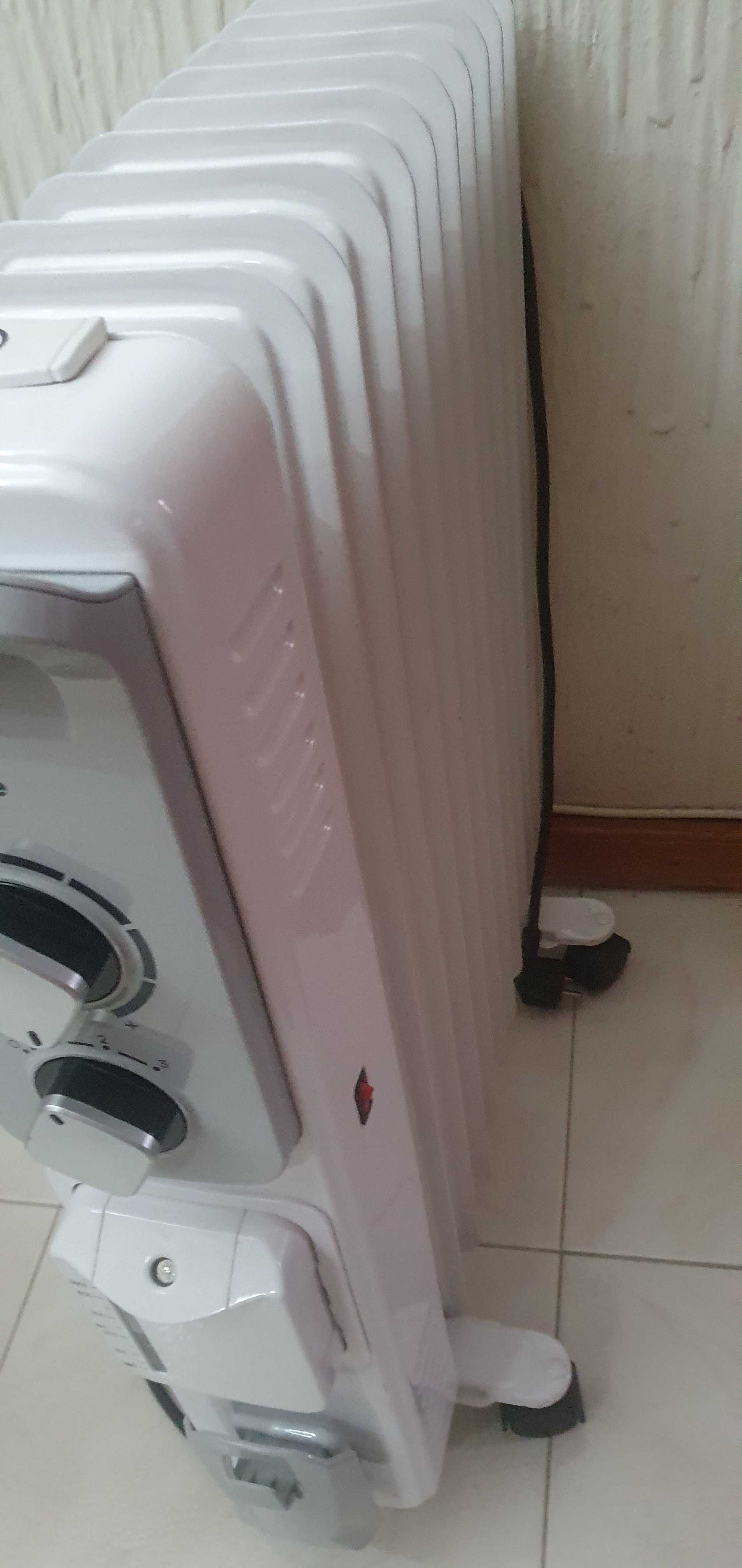 Vendo aquecedor a óleo portatil económico