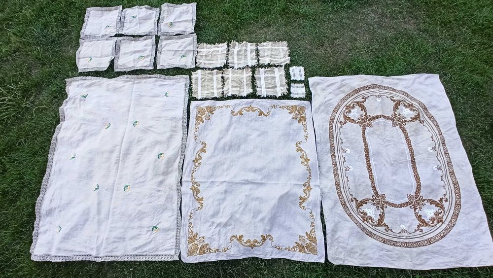 Ozdobne lniane haftowane obrusy z serwetkami