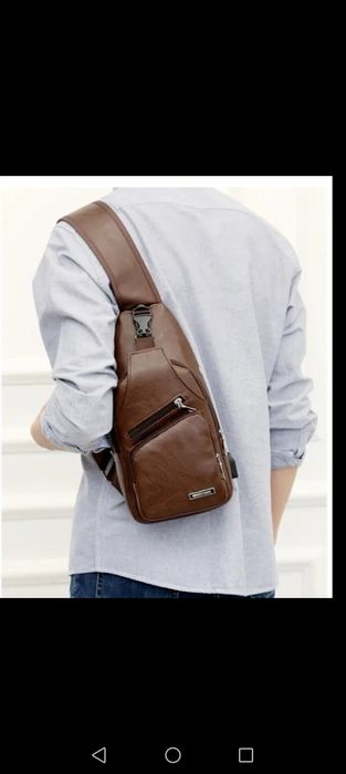 Сумка (барсетка) чоловіча темно-коричневого кольору.