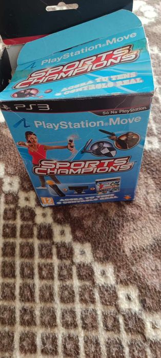 Playstation 3 + comandos move + 2 jogos sports champions + 5 jogos Ps3
