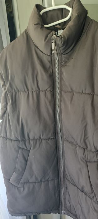 Жилет шоколадного кольору