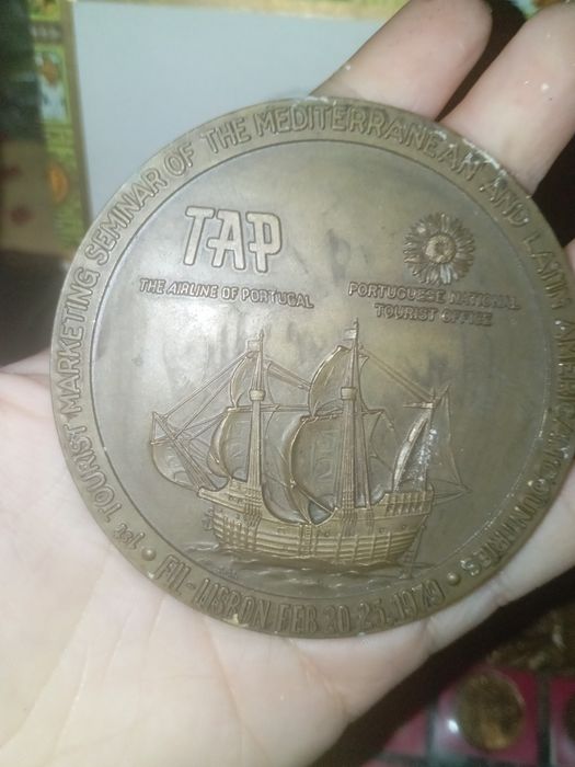 Medalha tap antiga
