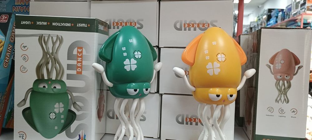 Розвиваюча музична іграшка танцювальний восьминіг з підсвічуванням