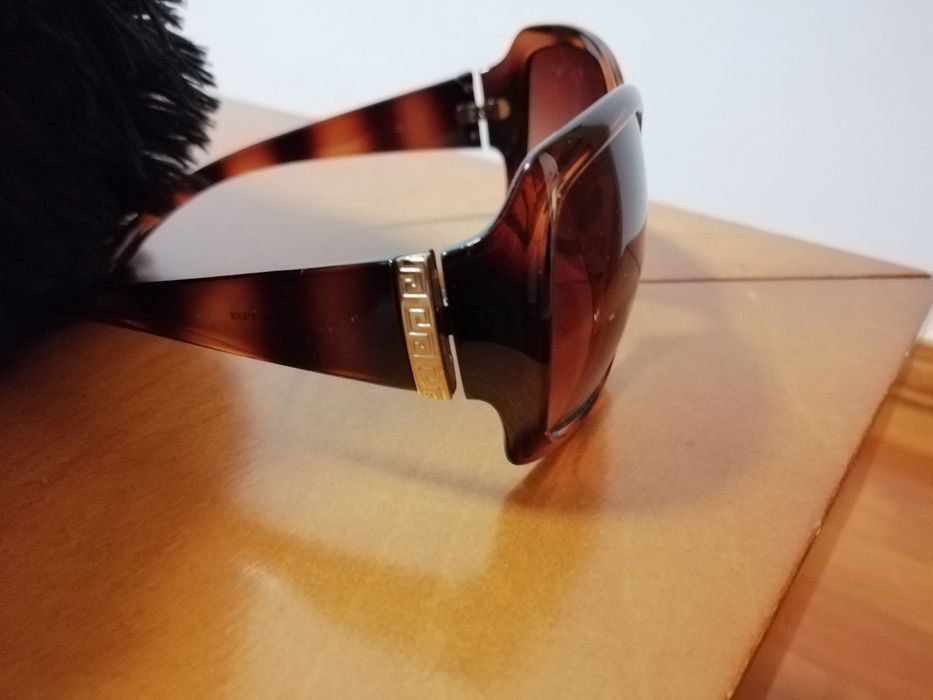 Óculos sol castanhos tartaruga