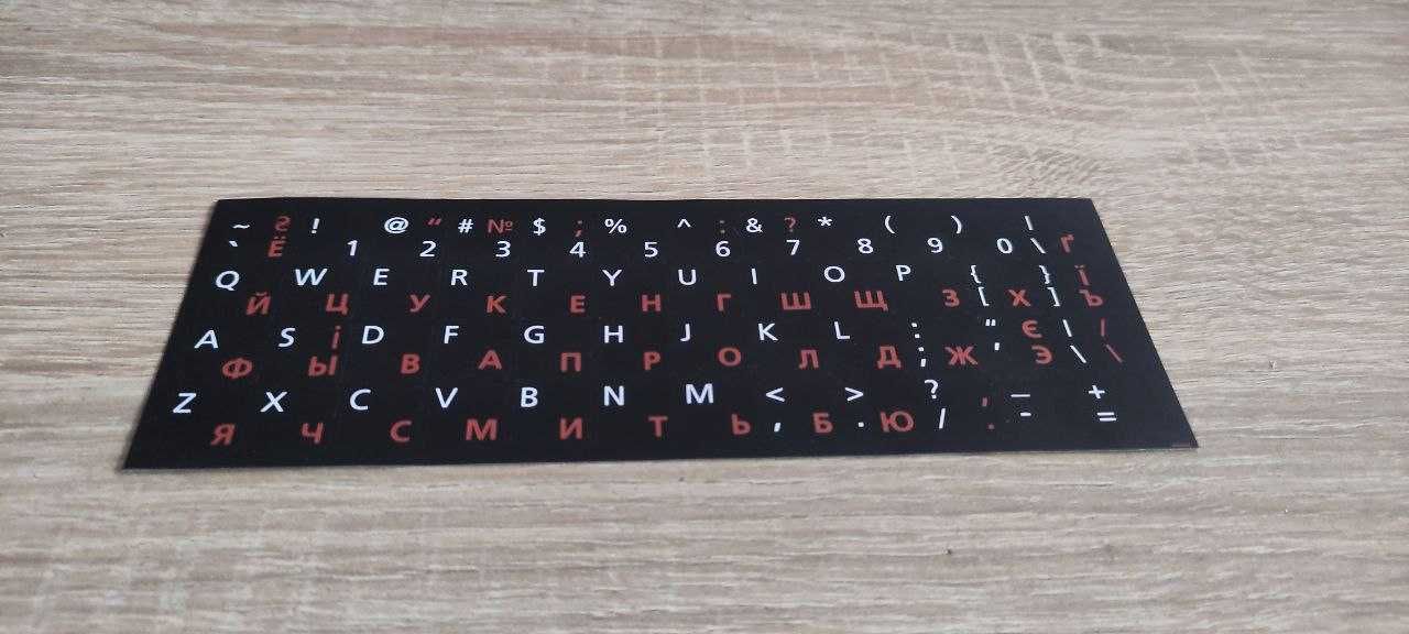 Наклейки на клавіатуру біло-червоні на чорній основі